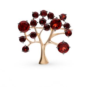 золотая брошь с гранатом