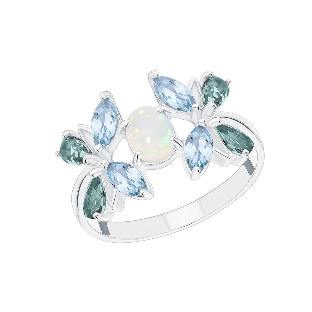 Фото «Серебряное кольцо с опалами, топазами и празиолит»
